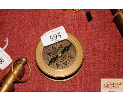 A navigating compass/magnifier