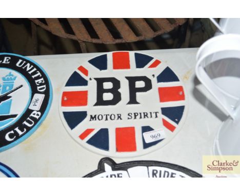 A reproduction BP Motor Spirit cast iron sign