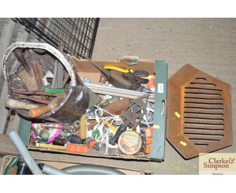 A tray box of various hand tools etc.and a cast iron fire basket