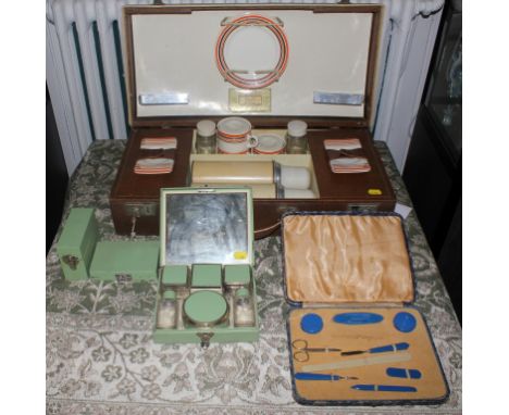 A Sirram tea and lunch outfit for four persons, patent number 306657 388355 and two travelling vanity sets