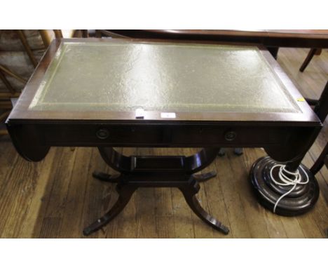 A Georgian-style mahogany sofa table with leather inset top, twin drop leaves, two frieze drawers with circular brass handles