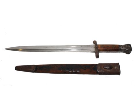 A 19th century bayonet with metal and leather scabbard by L. Kenson, London with wooden handle