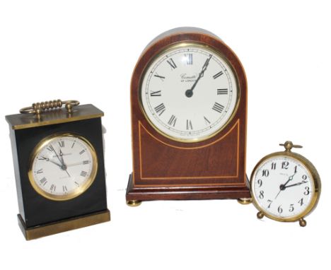 A mahogany cased mantle clock my Comitti of London, together with a brass / black cased quartz carriage clock with alarm by M