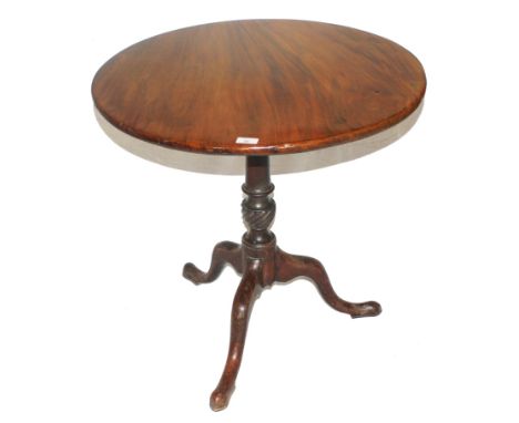 A late Georgian mahogany circular tip-top occasional table with turned central column and spiral knop on a tripod base with p