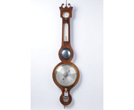 An early 19th Century inlaid mahogany wheel barometer
With a 20cm silvered dial enclosed within a brass bezel above a hygrome