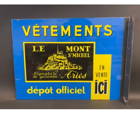 A French double sided enamel sign with hanging flange, advertising 'Vetements', excellent condition, 25 1/2 x 19".