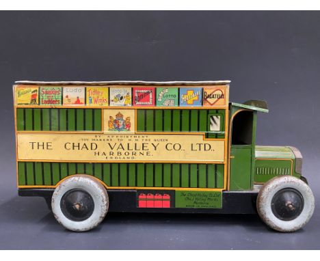 A Chad Valley clockwork tinplate delivery van.