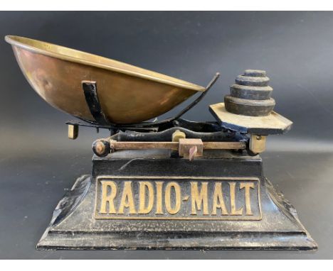 A large set of scales bearing the words Radio-Malt, the base 22 x 10 1/2". 