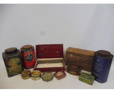 A quantity of large scale shop dispensing tins etc. 