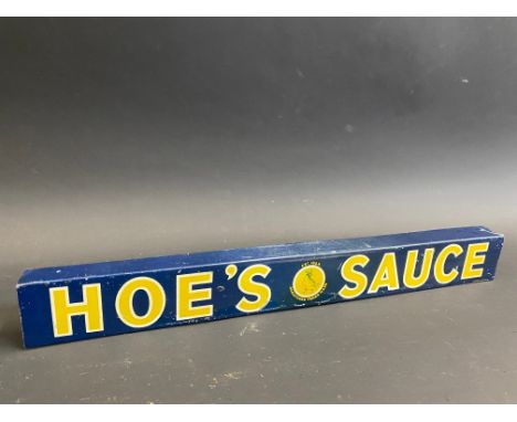 A shelf advertising strip for Hoe's Sauce, 14 1/2" long. 