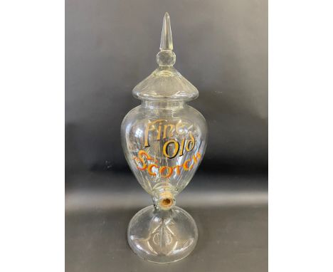 A superb Fine Old Scotch glass lidded dispenser, with outlet for a tap, 27" h overall.