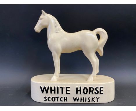 A White Horse Scotch Whisky double sided advertising figure in the form of a standing horse, 8 1/2" w x 9" h.