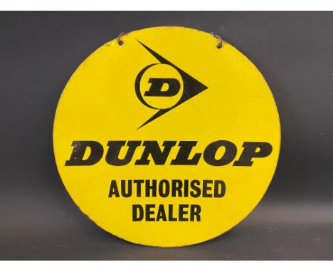 A Dunlop Authorised Dealer circular enamel sign, 18" diameter. 