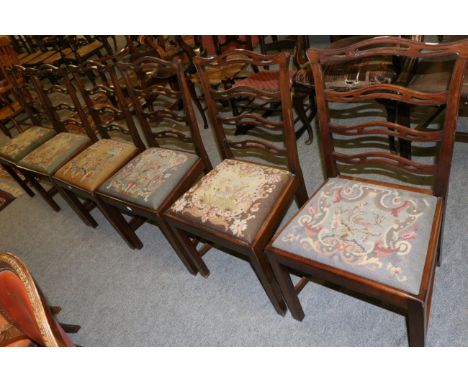 A set of six George III style ladder back dining chairs 