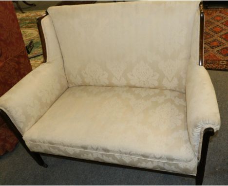 Edwardian mahogany inlaid two seater sofa, with cream damask upholstery 