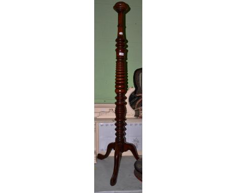 A mahogany tripod standard lamp 
