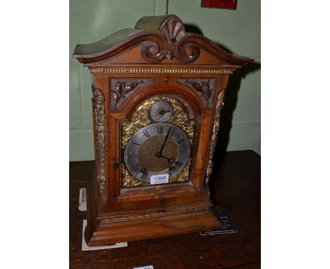 Carved mahogany cased bracket clock 