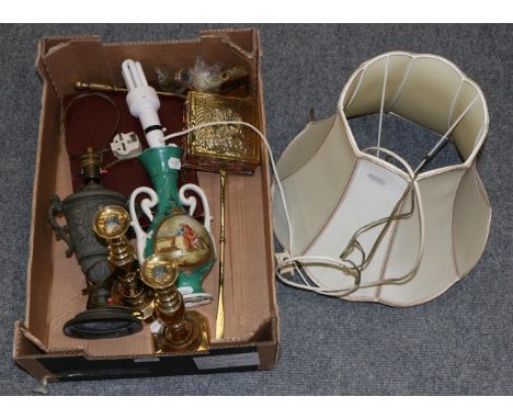 A porcelain table lamp, a cast metal table lamp, a pair of brass candlesticks, small warming pan and place mats 