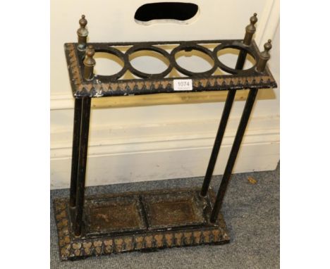 A Victorian cast iron four division stick stand 