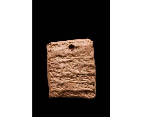 Ca. 1900 BC. A rectangular-section ceramic tablet with rounded edges and corners, bearing cuneiform script. These tablets wer