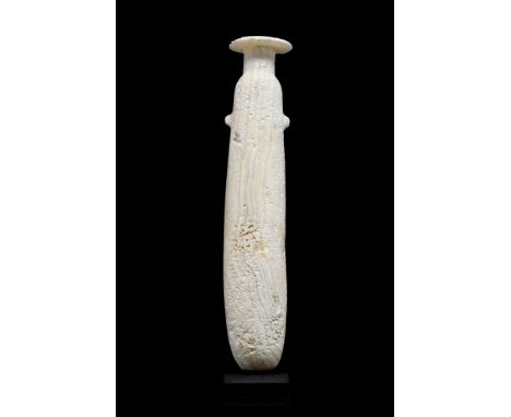 Late Period, Ca. 664-332 BC. The elongated body on a rounded base, with a wide, thin disk rim, two vestigial lug handles. Fin