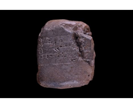 Ca. 1900 BC. A rectangular-section ceramic tablet with rounded edges and corners, bearing cuneiform script. These tablets wer