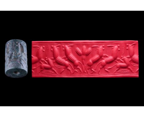 Ca. 1900-1600 BC. A nicely carved black stone cylinder seal from the Isin Larsa to Old Babylonian period, first half of the s