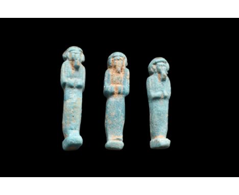 Late Dynastic Period to Ptolemaic Period, Ca. 664-332 BC. An ancient Egyptian mummiform ushabti group of three, each wearing 