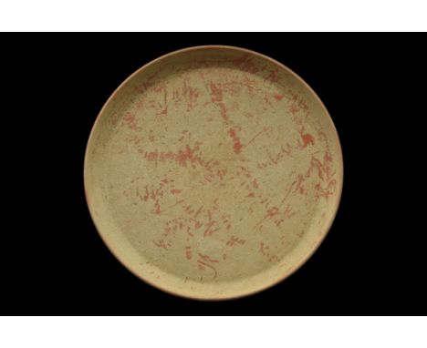 Ca. 300-400 AD. A large terracotta shallow plate or dish with its walls gently tapering to a wide, flat bottom and a narrow r