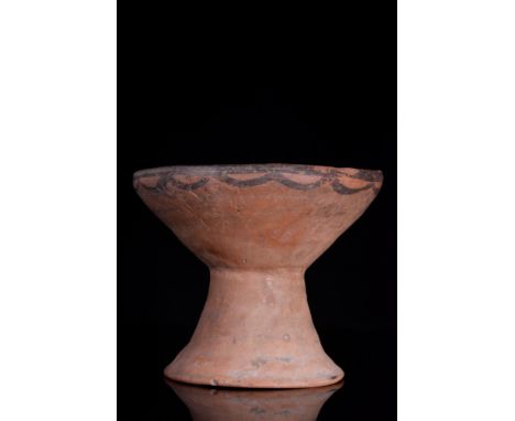 Machang Phase, Ca. 2300-2000 BC. A stem bowl with a basin of flaring walls sitting on a trumpet-shaped foot with a short, hol