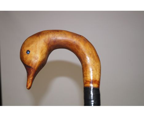 Walking stick with a duck handle