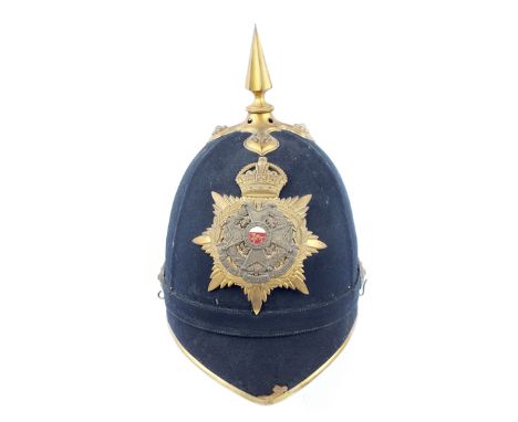 An Officer’s 1902-1914 era 1878 Pattern Blue Cloth Home Service Helmet to the Border Regiment, the blue cloth covered skull w