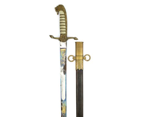 A Victorian blued and gilt midshipman’s dirk, 46cm blade decorated with scrolling foliage on a blued ground and highlighted w