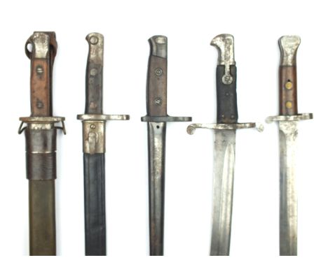 A 1907 Pattern bayonet, with 1917 American Pattern scabbard, worn blade, a Spanish Model 1893 Knife bayonet with scabbard, An