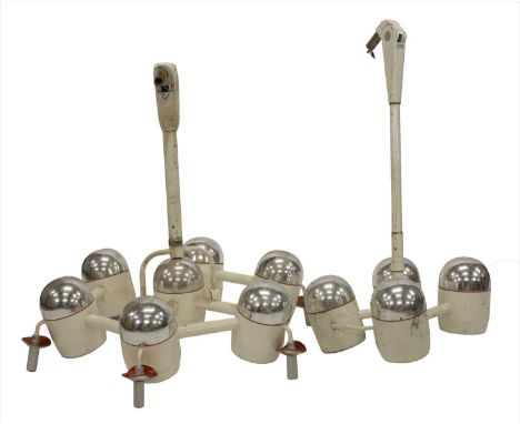 A five-light operating theatre rig, by Brandon Medical, 85cm high approximately, and a four-light set, 50cm high approximatel