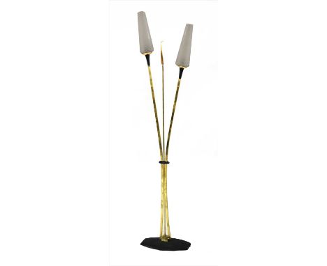 A brass and black lacquered standard lamp, 1950s, with tapering cylindrical glass shades, 157.5cm high