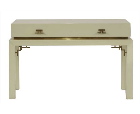 A lacquered side table, with a single frieze drawer, with brass handles and spandrels, 130cm wide 37cm deep 85cm high