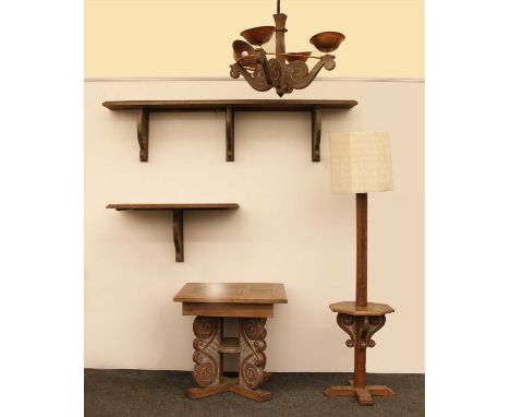 A French suite of carved oak furniture, comprising: a centre table, 78.5cm square 74.5cm high, a standard lamp, with a shelf,