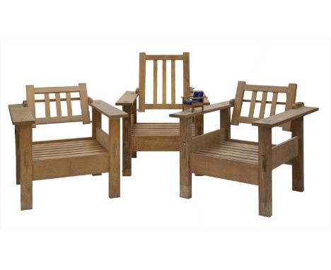 A set of three oak reclining chairs, two with low backs, the other higher, lacking baton, all lacking seats, 78cm wide 91.5cm