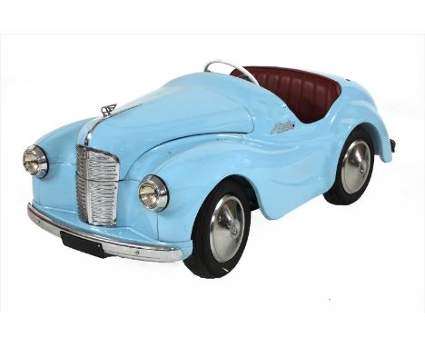 An Austin J40 child's pedal car, painted blue and having a leather burgundy upholstered seat, 150cm long