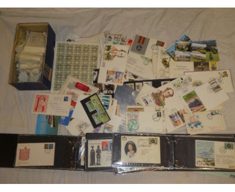 A box containing two cover albums, loose covers, first day covers, GB sorted commemorative stamps etc.