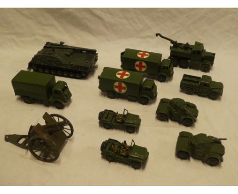 A selection of Dinky military vehicles including Army wagon, military ambulance, recovery tractor, two Austin jeeps, etc toge