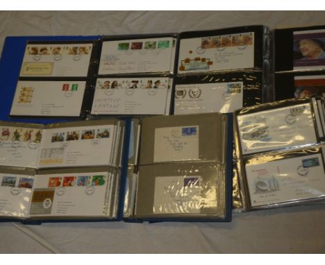 Five folder albums containing a collection of GB and World first day covers and postal covers, mainly 1960's-1980's