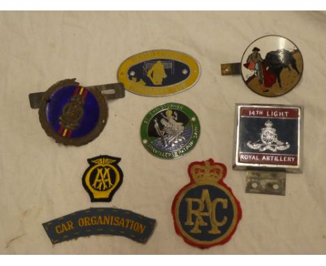 An embroidered AA badge, RAC badge, Car Organisation shoulder title and five various car badges including enamelled RAOC, 14t