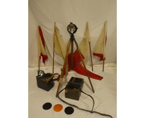 A selection of First War signalling items including long range signalling lamp dated 1918 with tripod, carrying case, filters