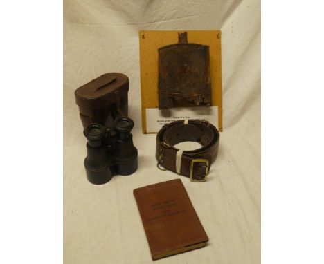 A selection of First War items including Field Service pocket book dated 1914, Sam Browne 1917 waist belt, relic British Army