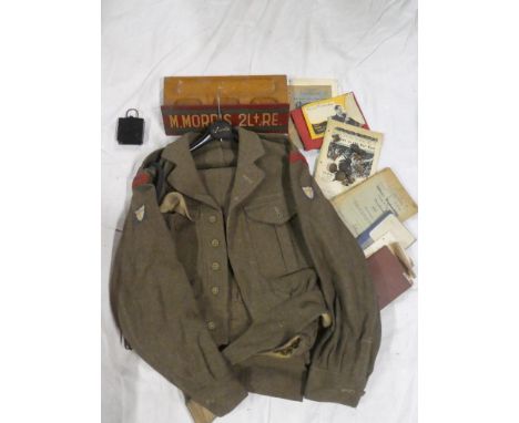 An 1951 pattern battle dress blouse and trousers to a Lieutenant of the Royal Engineers together with painted desk stand "M. 