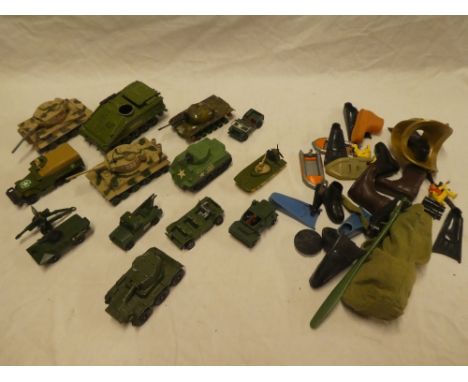 Various diecast military vehicles including Corgi, Dinky etc. and a small selection of various Action Man clothing