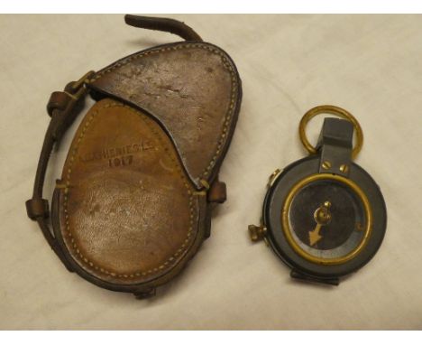 A First War Officer's marching compass dated 1917 in leather case dated 1917