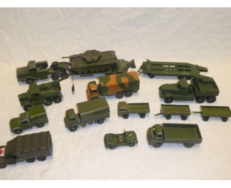 A selection of Dinky military vehicles including recovery tractor, Mighty Antar tank transporter with tank, 1 ton cargo truck